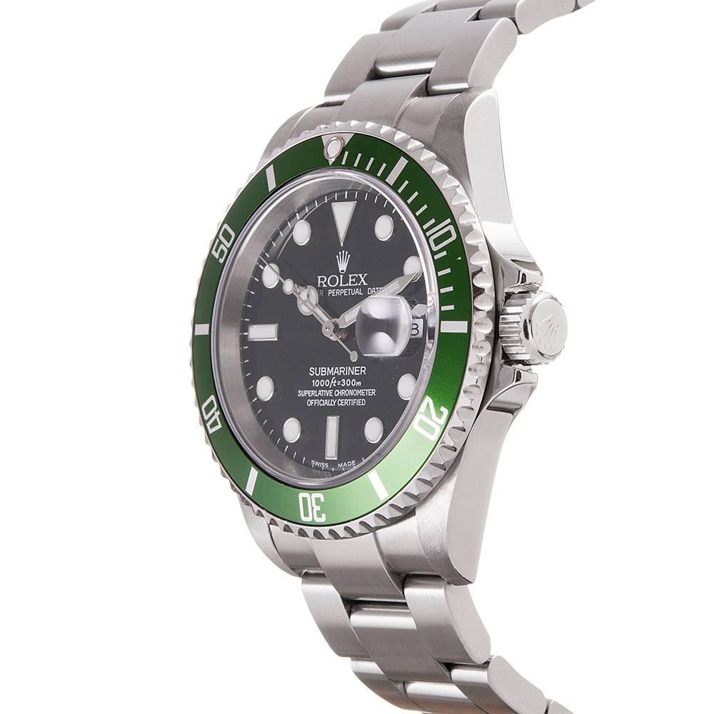 Offered in mint condition, this is the most desirable variation of the original, now-discontinued, anniversary Submariner. This example boasts the MK I dial with the squished “O” and flat “4” bezel. Bracelet #93250. 40mm. Ref #16610LV