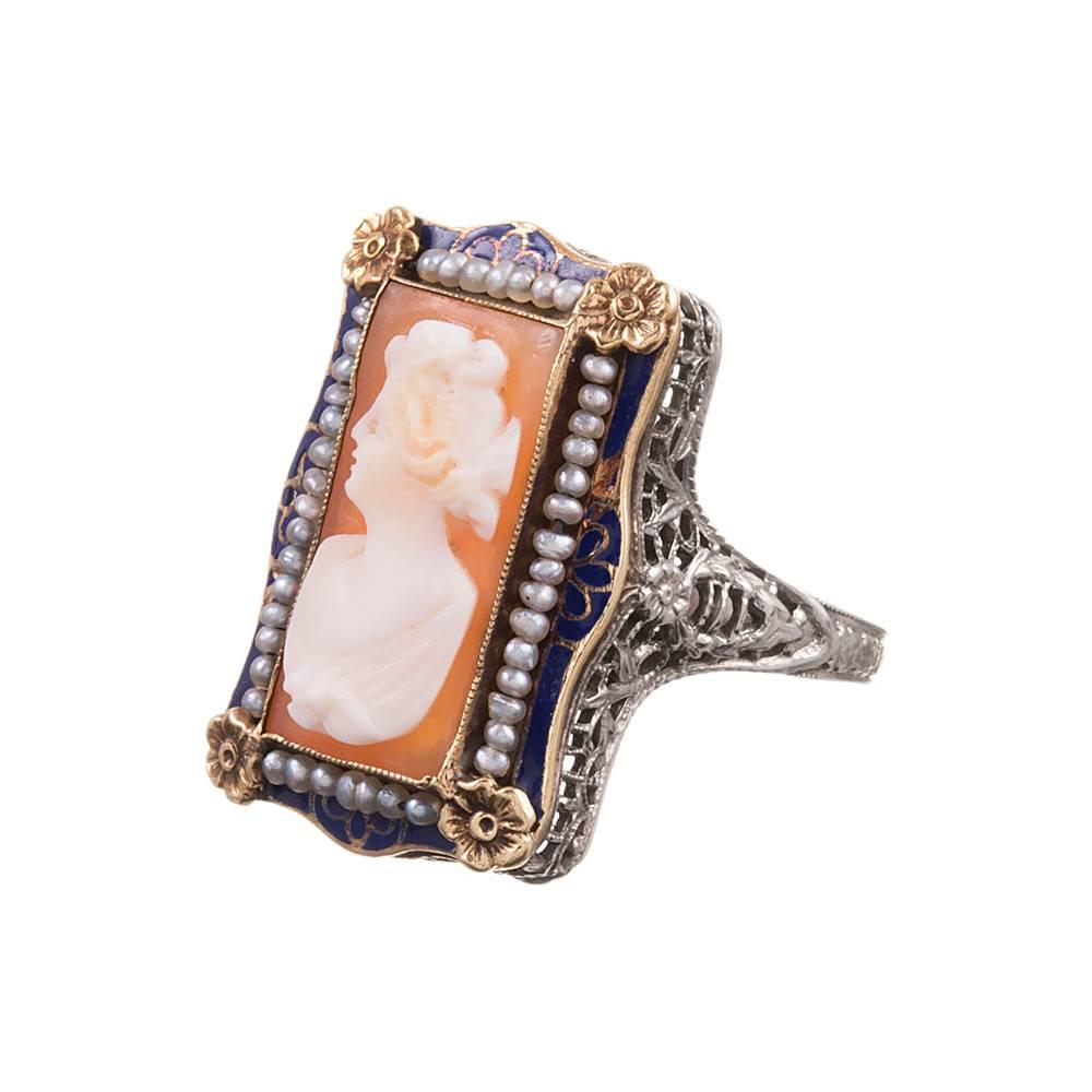 American made in 14k white and yellow gold filigree ring with a center hand carved portrait cameo, framed with seed pearls, rich blue enamel and agate. The ideal balance of bold size and the sweet, feminine nature of cameos. Size 6.5 can be resized