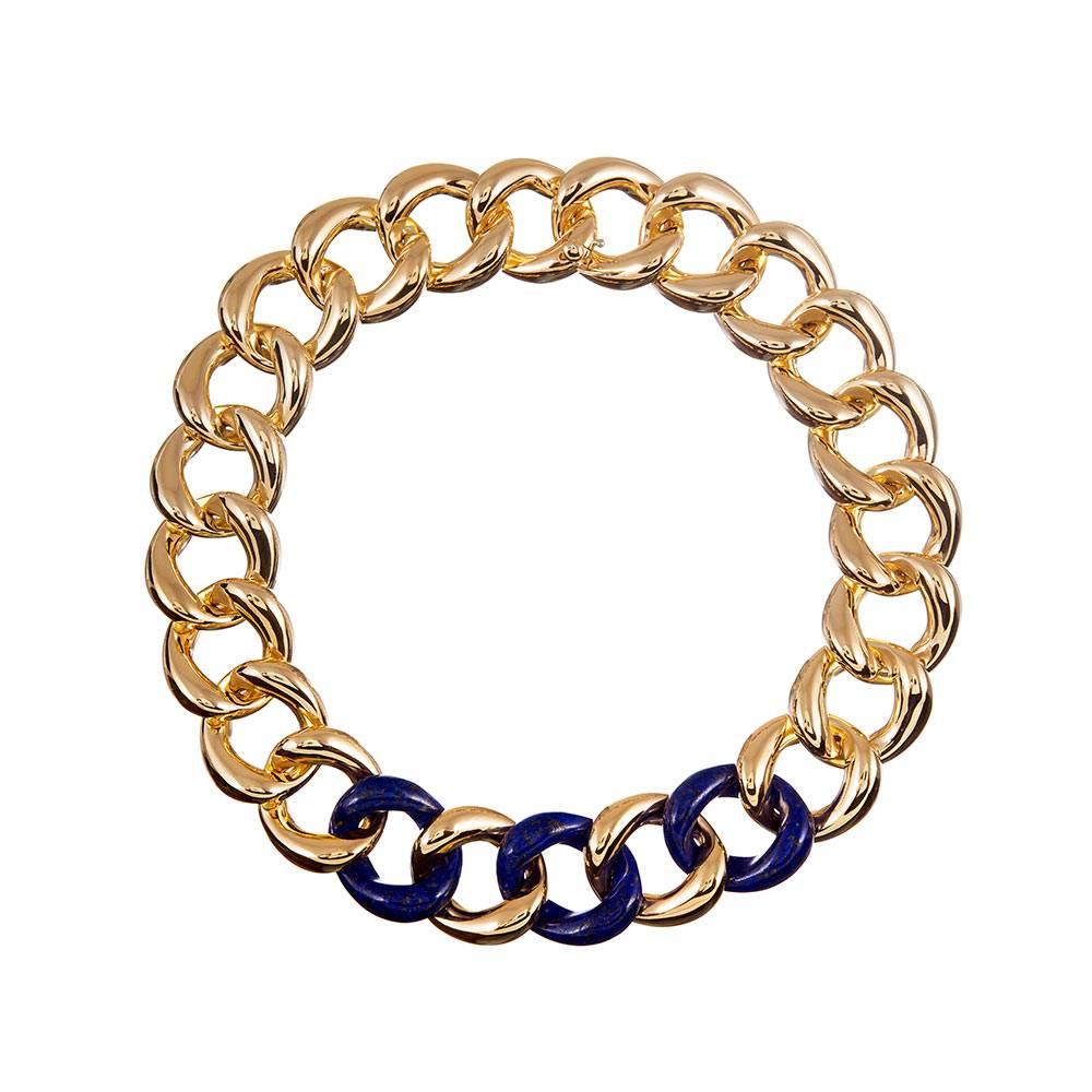 An instant classic, compliments of iconic jewelry designer Seaman Schepps. Hand carved links of lapis lazuli alternate with identical links of 18k yellow gold, embracing the classic mid-century aesthetic that is forever chic. 17 inches long and just