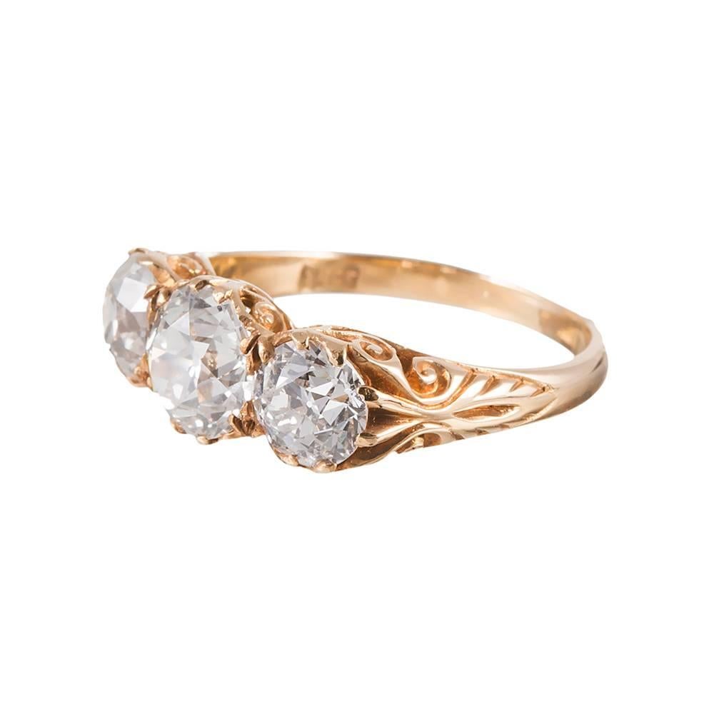This classic style is beloved by antique jewelry enthusiasts, due to its high level of detail, yet wearable shape. The ring is beautiful from every angle- note the beautiful carved detail on the sides- yet maintains a comfortable low profile on the