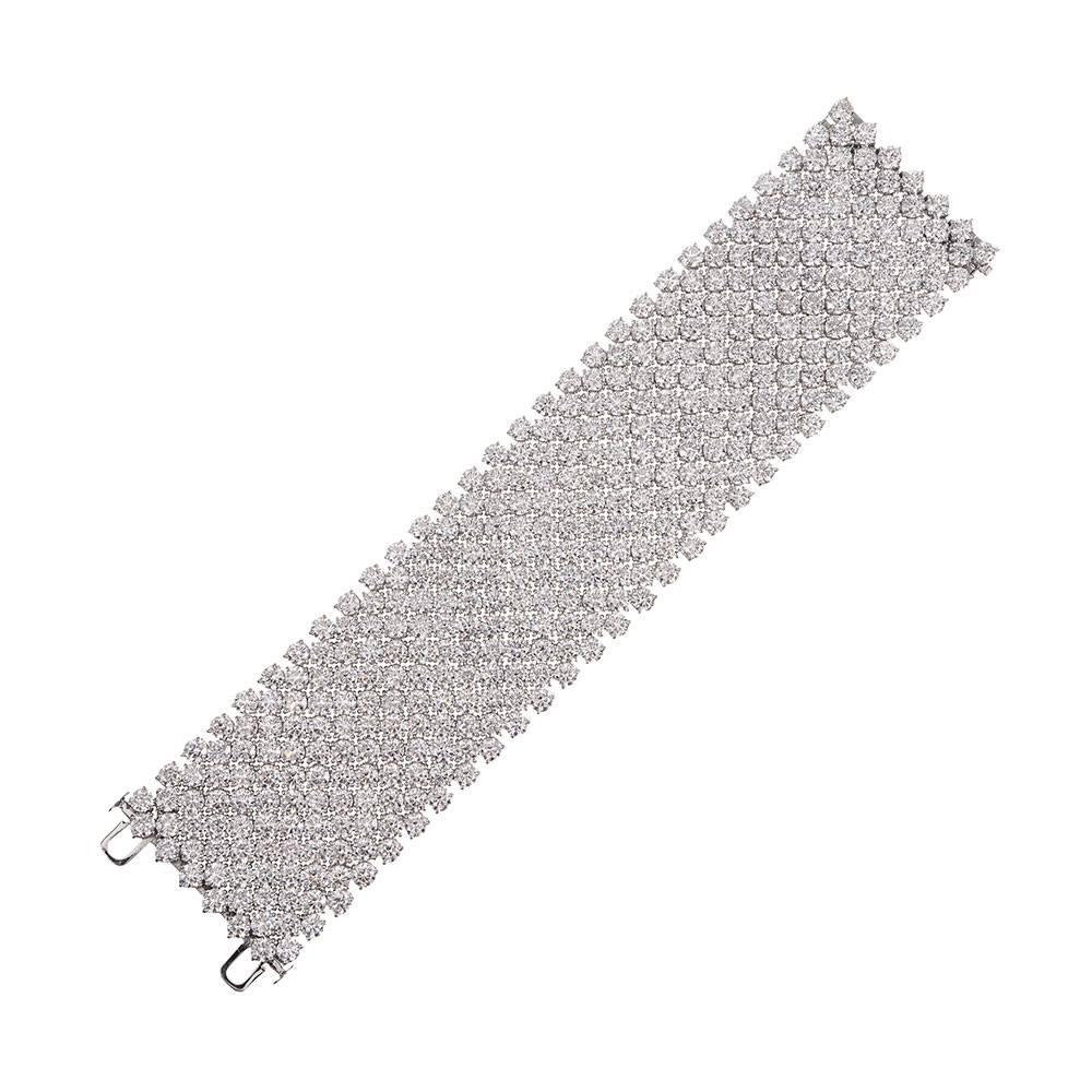 Enrobing your wrist an an entire carpet of brilliance, this most impressive bracelet is worthy of the most elite of jewelry collectors. This one is guaranteed to turn some heads! Crafted in 18k white gold and set with an astounding 113.51 carats of