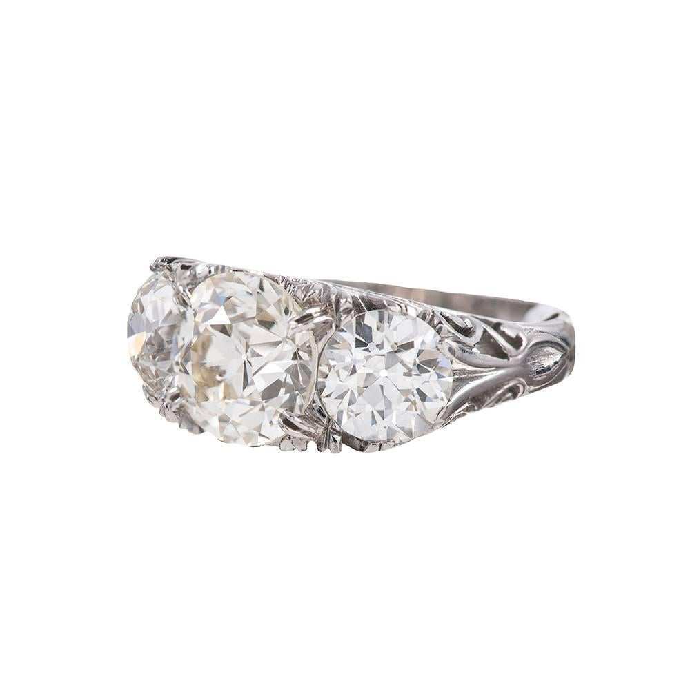 Featuring a center Old-European-Cut Diamond weighing 3.52 carats L-M color, Vs1-2 clarity. Further accented by two Old-European-Cut Diamonds weighing 3.14 carats J color, Vvs2 clarity. Accompanied by an IGI Certificate. 