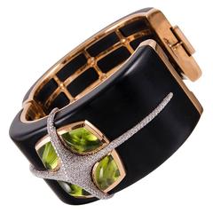 Valente Manchette en ébène, péridots et diamants