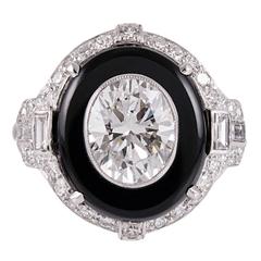 2.01 Carat Oval Center Diamond Onyx Platinum Ring