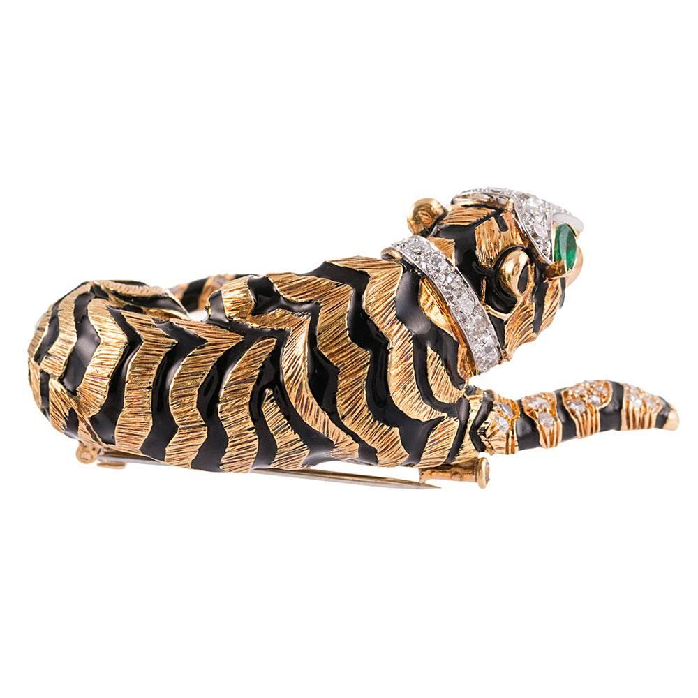 David Webb’s iconic creations are hallmarked by his illustrious animal-themed jewels. This substantial brooch measures 2.5 by 1.25 inches and offers an exceptional rendering of a tiger, his golden “fur” textured with masterful skill and his glossy