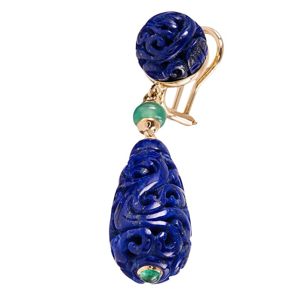 Measuring just hint under 2 inches and displaying a lovely pair of lustrous carved lapis end pieces and decorated with chrysoprase and emerald beads. Part of the "Canton" collection, compliments of iconic American jeweler Seaman Schepps.