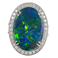 10.88 Carat Oval Lightening Ridge Opal and Diamond Ring