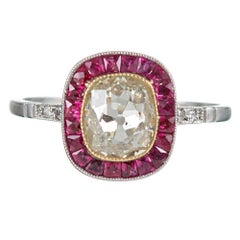 1.25 Carat Old European Cushion Cut Fancy Light Yellow Diamond Ruby Halo Ring 1.25 Carat Old European Cushion Cut Fancy Light Yellow Diamond Ruby Halo Ring