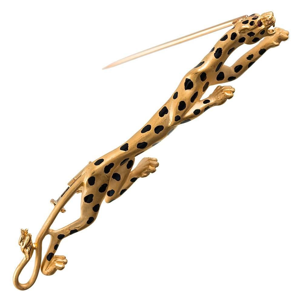 Sleek and stealthy, the panther measure 2.5 inches long and a mere .25 inch high. Made of 18k yellow gold and spotted with black enamel, he will sneak his way into your jewel box and become your favorite creature! Signed Carrera y Carrera.
