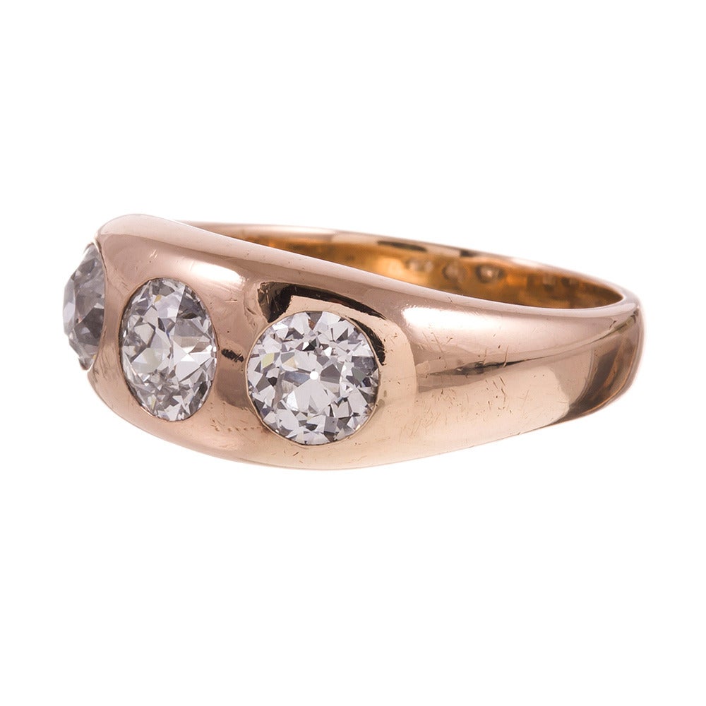 14k yellow gold ring, classic “gypsy” style, with three European cut diamonds that weigh 2.30 carats in total. An authentic piece, circa 1935. Suitable for a lady or a gentleman. This size 9.75 ring can be resized on request.