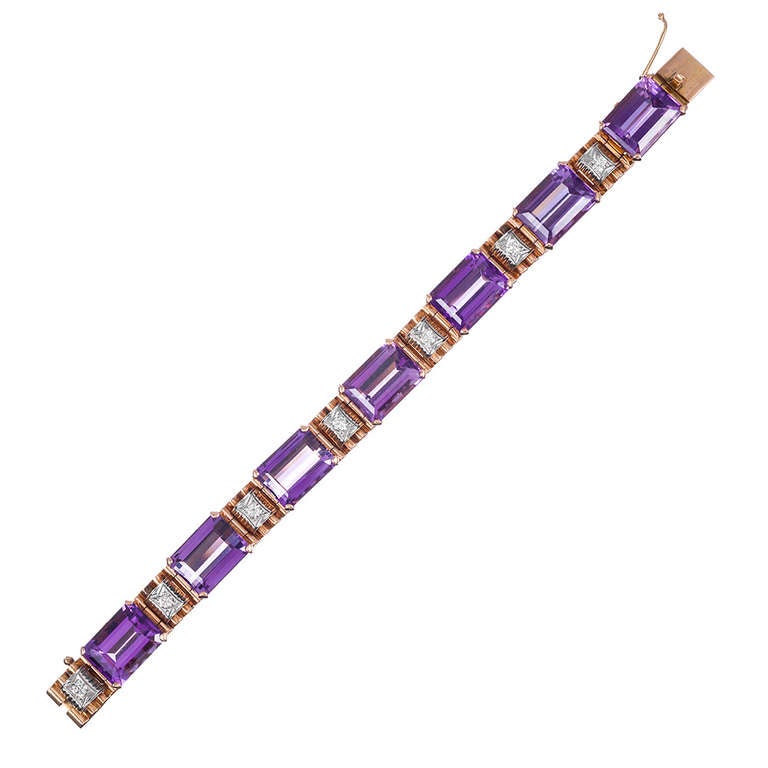 Deep rich and perfectly matched amethyst gemstones alternating with a near quarter carat round brilliant cut diamond every other link.  Made entirely in 18k rose gold, this bracelet was handmade to perfection circa 1940.