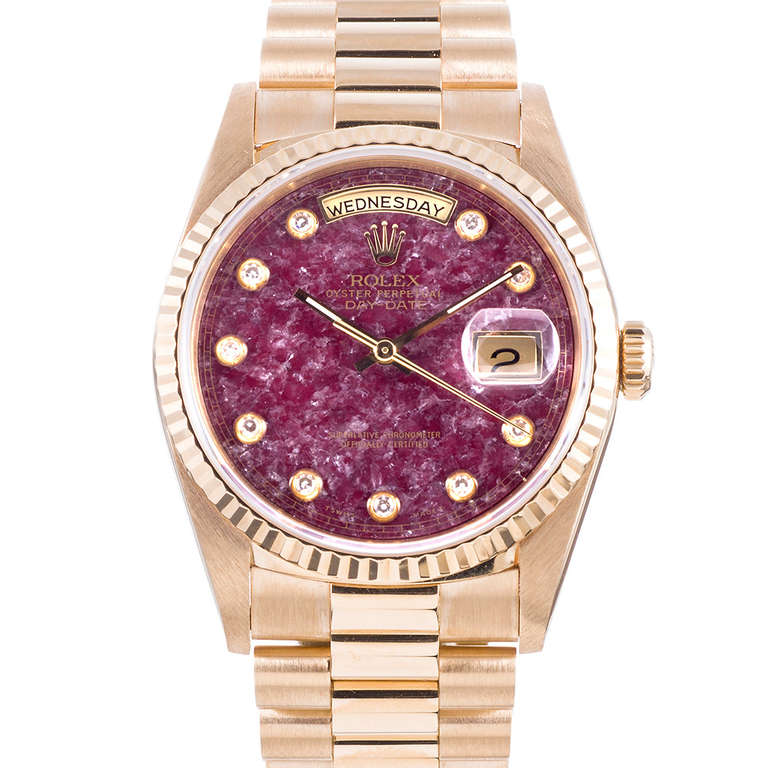 This is the most beautiful stone dial we have encountered, with an intensity of color that is absolutely magical. The variation and depth of color and texture on the dial are unrivaled and are enhanced by brilliant round diamonds, set in round (not