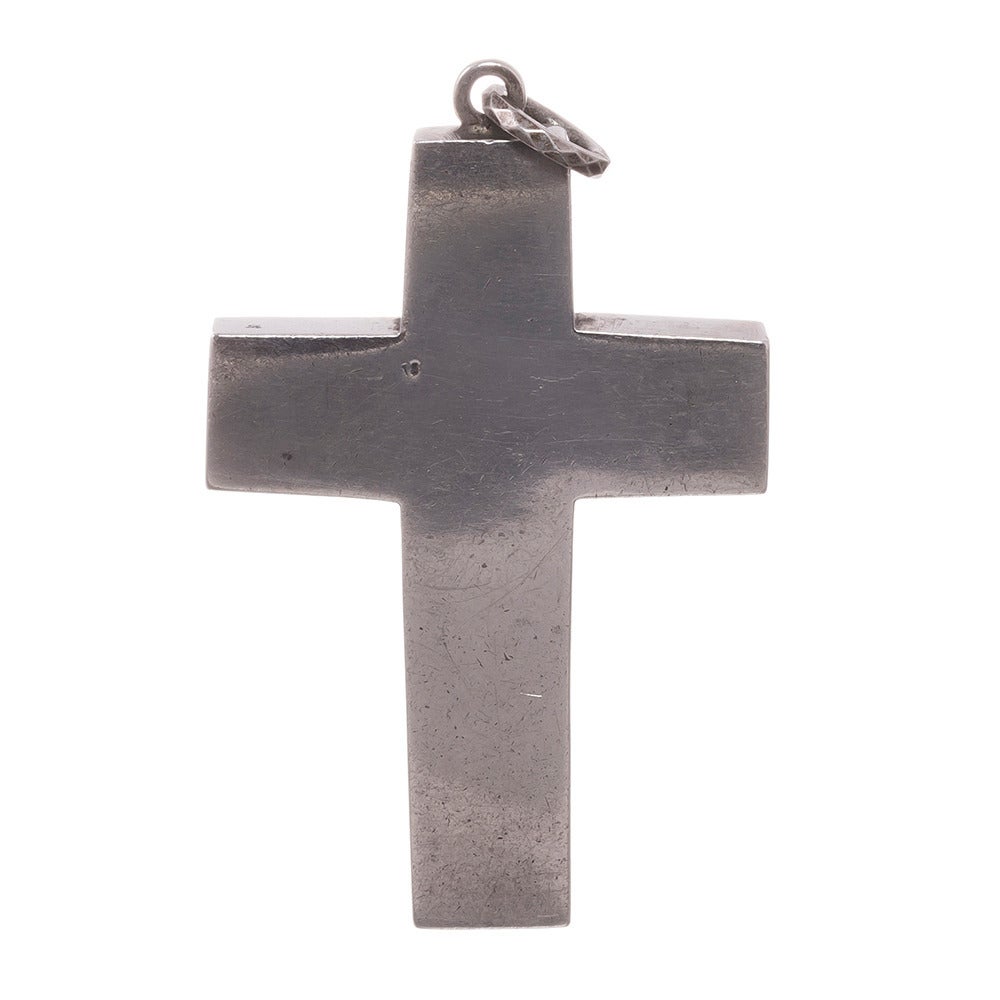 Silver cross, set with multi-hued Scottish agate. 2 inches by 1.5 inches (without the jump ring). This is a beautiful, organic hand made relic, made circa 1890. Add it to your favorite silver chain or silk cord necklace.