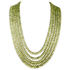 Multi-Strand Peridot Necklace with Asymmetrical Cabochon Ruby Clasp