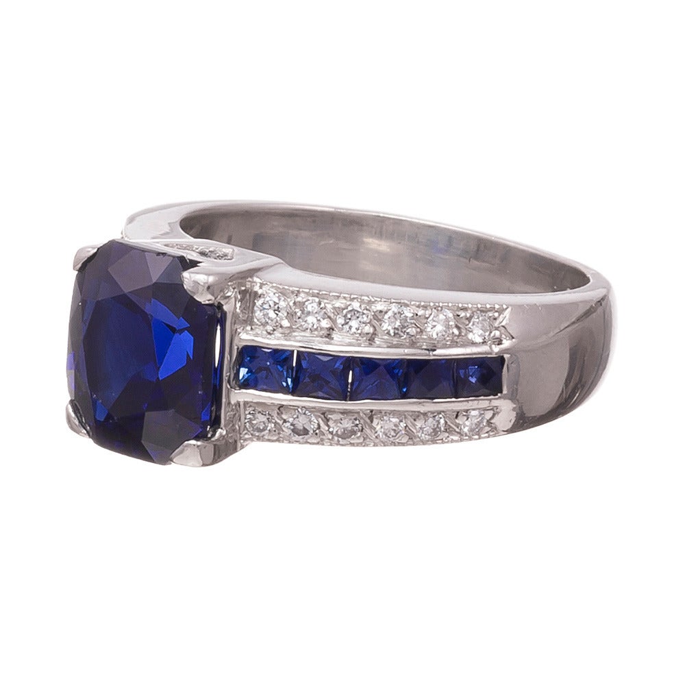 Set in platinum, the 4.25 carat center sapphire is very much the star of the show, exhibiting really beautiful, intense deep blue color. Look closer and notice the lovely details in the mounting: .51 carats of brilliant round diamonds and .71 carats