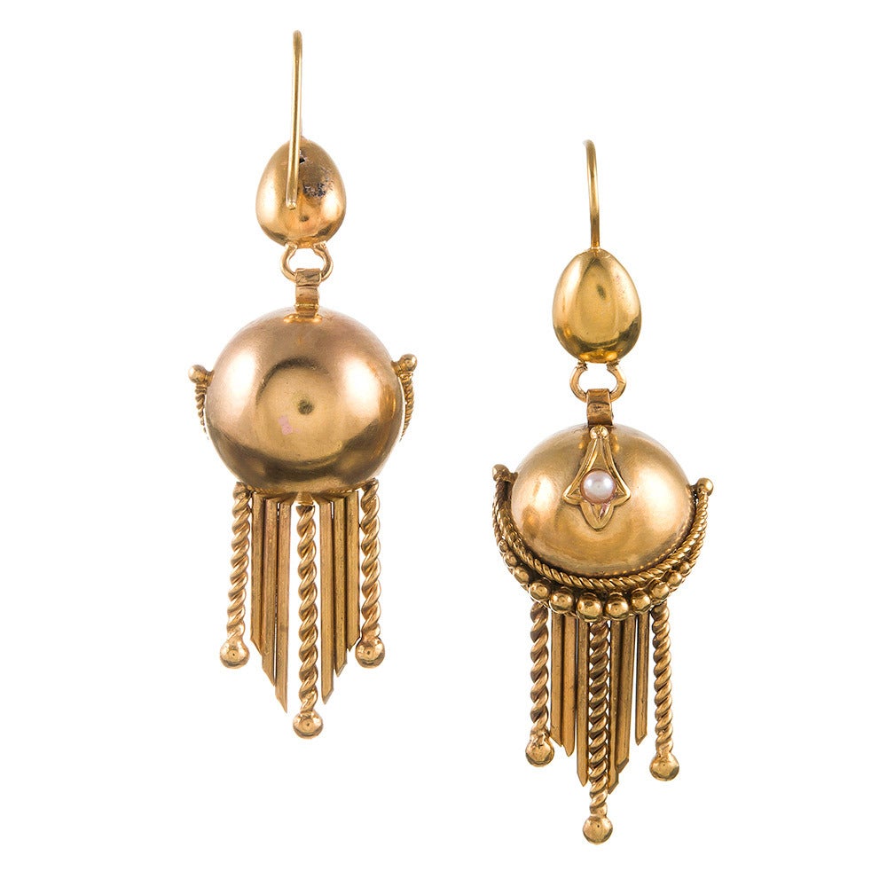 15k yellow gold Victorian earrings, beautifully preserved condition and designed as a set of polished golden orbs with dancing, textured fringe, then decorated with a pearl-set star. The earrings are approximately 2 inches in length, including the