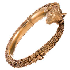 Heavily Granulated Etruscan Ram’s Head Gold Bangle Bracelet