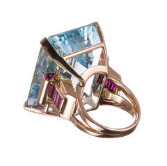 Retro 70.68 Carat Aquamarine and Ruby Gold Ring