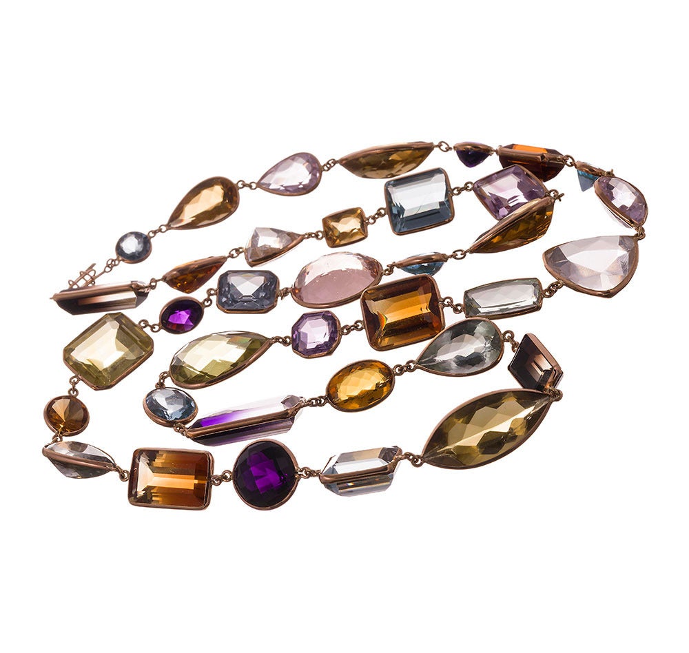 This qualifies as playful fine jewelry! 36 inches of large colored gemstones, mixed shapes and material including citrine, peridot, aquamarine, amethyst, topaz and tourmaline in faceted ovals, squares, hearts, marquis, rectangles, pearls, triangles