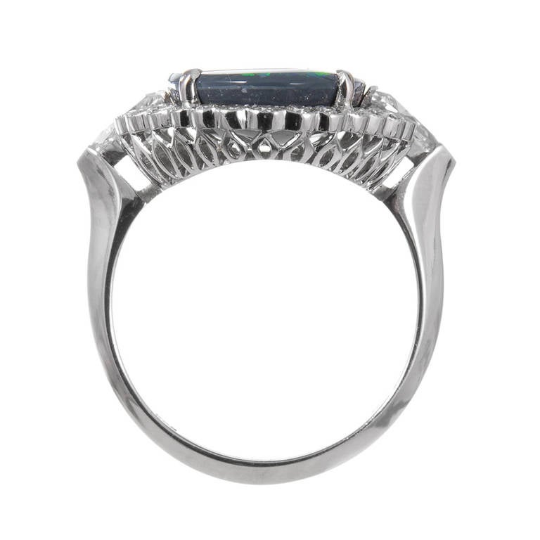 Oval Cut Important 7.50 Carat Lightning Ridge Opal Diamond Cluster Ring For Sale