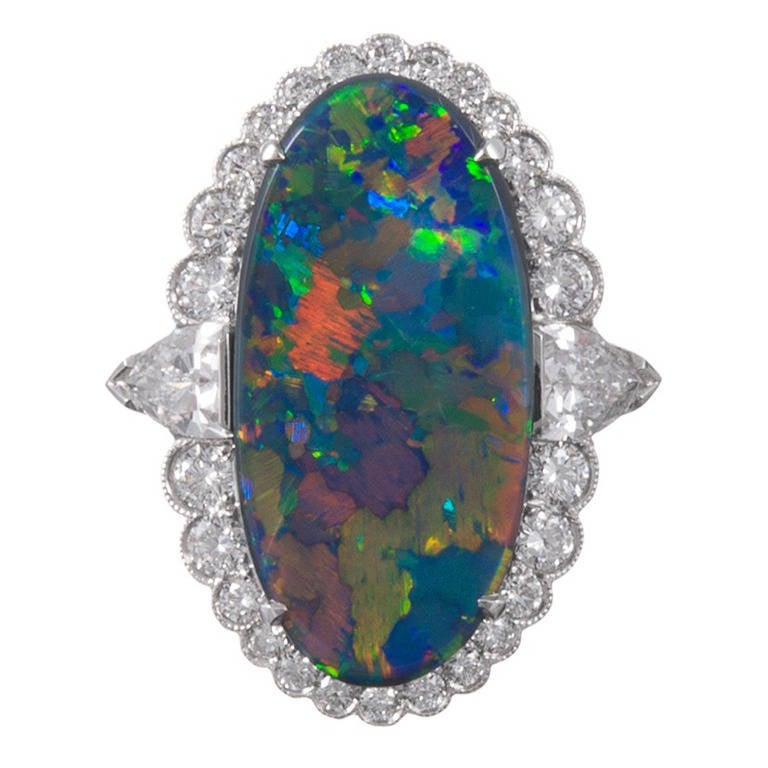 Important 7.50 Carat Lightning Ridge Opal Diamond Cluster Ring For Sale