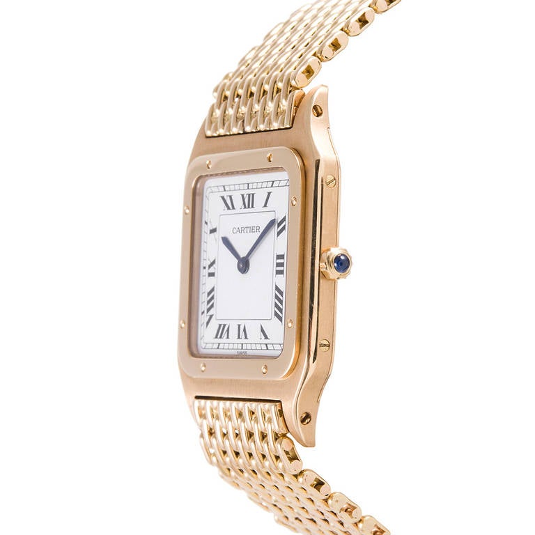18k yellow gold Cartier wristwatch with a gorgeous mesh bracelet and deployant buckle. Full compliment of hallmarks on the case back. The case measures 27 millimeters wide and 36 millimeters from tip-to-tip of the case lugs. The bracelet is 7.5
