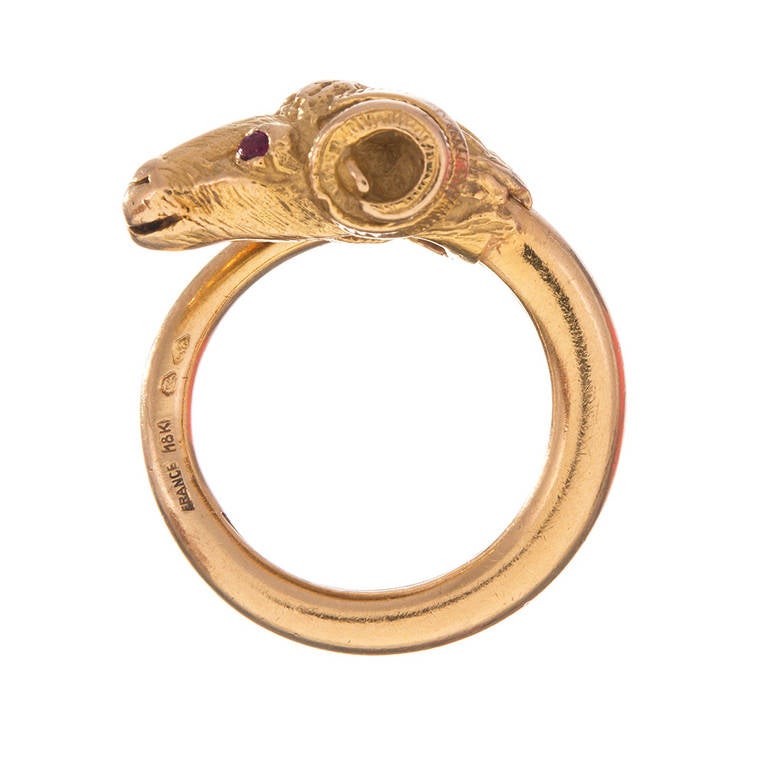 Bearing a full compliment of French hallmarks, this charming little ram ring will add a hint of happiness to your jewel box. 18k yellow gold, with ruby set eyes and created with abundant attention to detail. Sizeable on request.