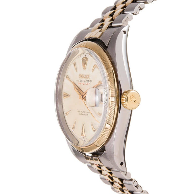 An rare example of the iconic Rolex Datejust. With 1950s watches becoming of increasing interest to collectors, this piece boasts a hearty list of noteworthy features: red writing on the dial, original hands and markers, an all red date wheel and an