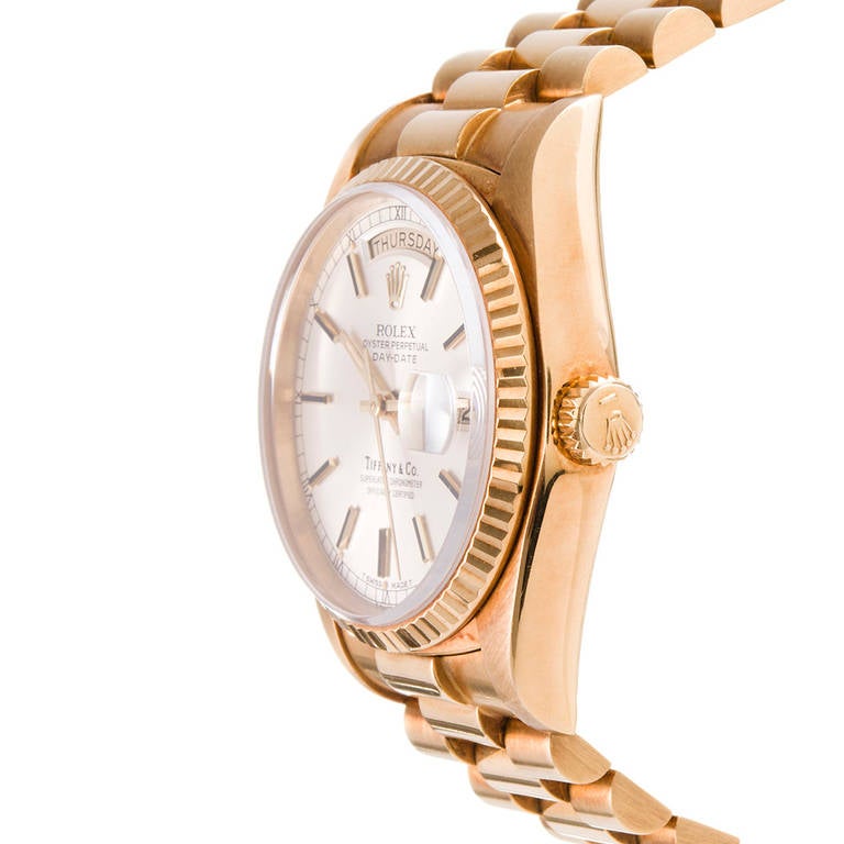 An early 18k yellow gold sapphire-crystal Day-Date with an original Tiffany & Co dial. Tiffany & Co. sold Rolex exclusively from their NYC store and Rolex allowed them to apply their name to the dial. Since this partnership no longer exists, these