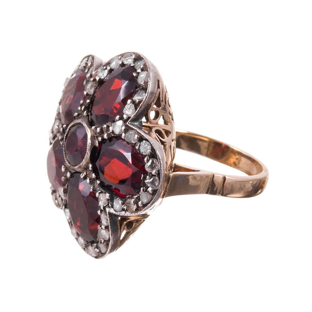 Silver over yellow gold ring with garnet 