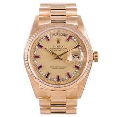 Rolex Yellow Gold Day-Date Wristwatch with Baguette Ruby and Diamond circa 1980s