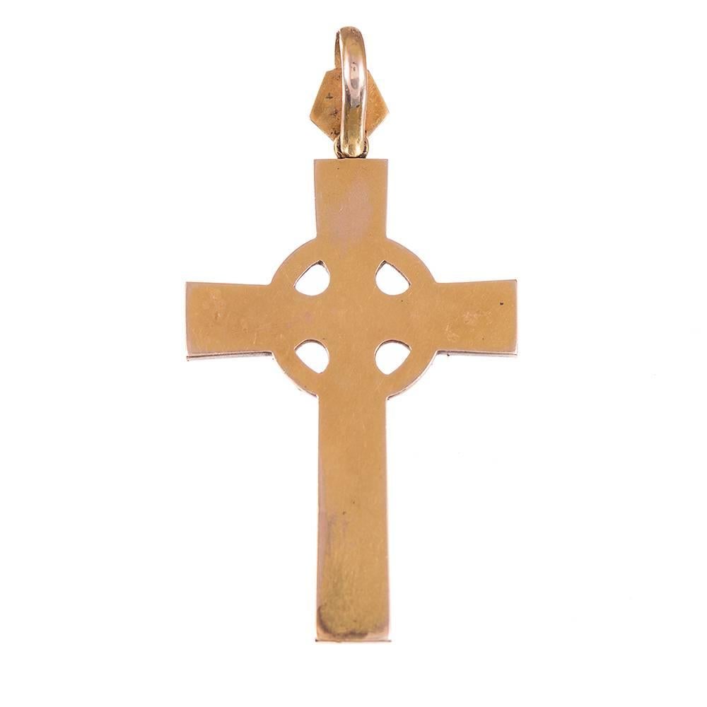 Made in England during the grand Victorian era, circa 1880, this beautiful cross combines organic natural gemstones with skilled craftsmanship to create a striking pendant. Celebrate your devotion while enjoying the classic combination of natural