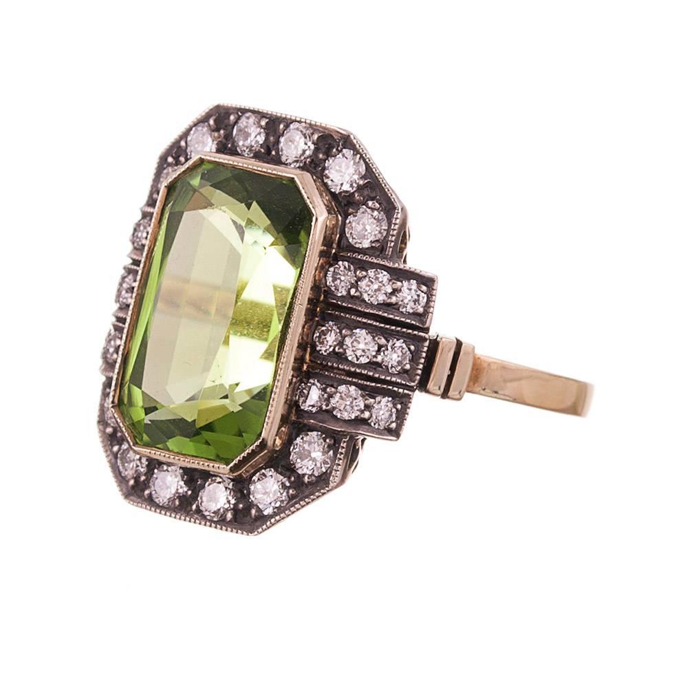 A new piece made in the tradition of Victorian era jewelry of 18k yellow gold and silver. The plaque style is versatile and comfortable, with a low profile that makes this impressive piece suitable for daily wear. The peridot weighs 6.53 carats and
