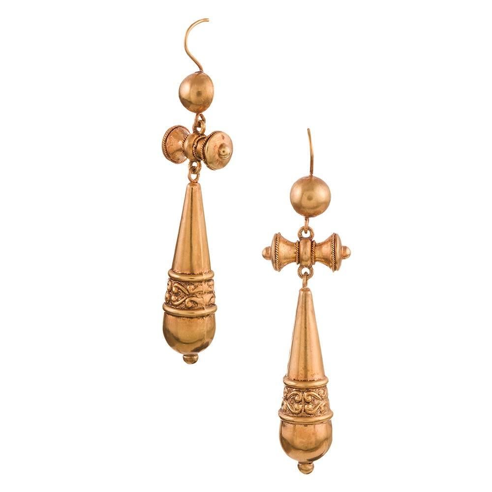 Measuring 2.25 inches in overall length and easily worn from day to night, these Victorian earrings might just be the ideal “go to” pair to suit all of your outfits. The absence of gemstones compliments casual attire, while the unique geometric