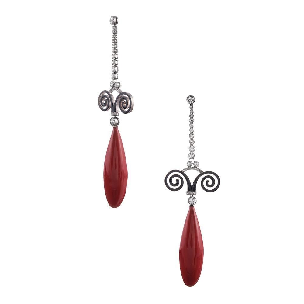 Combining style elements from the at deco era with those from the mid 20th century in grand fashion, these striking earrings measure an impressive 3.75 inches in overall length. You will not go unnoticed wearing these fun, bright ornaments! 

But
