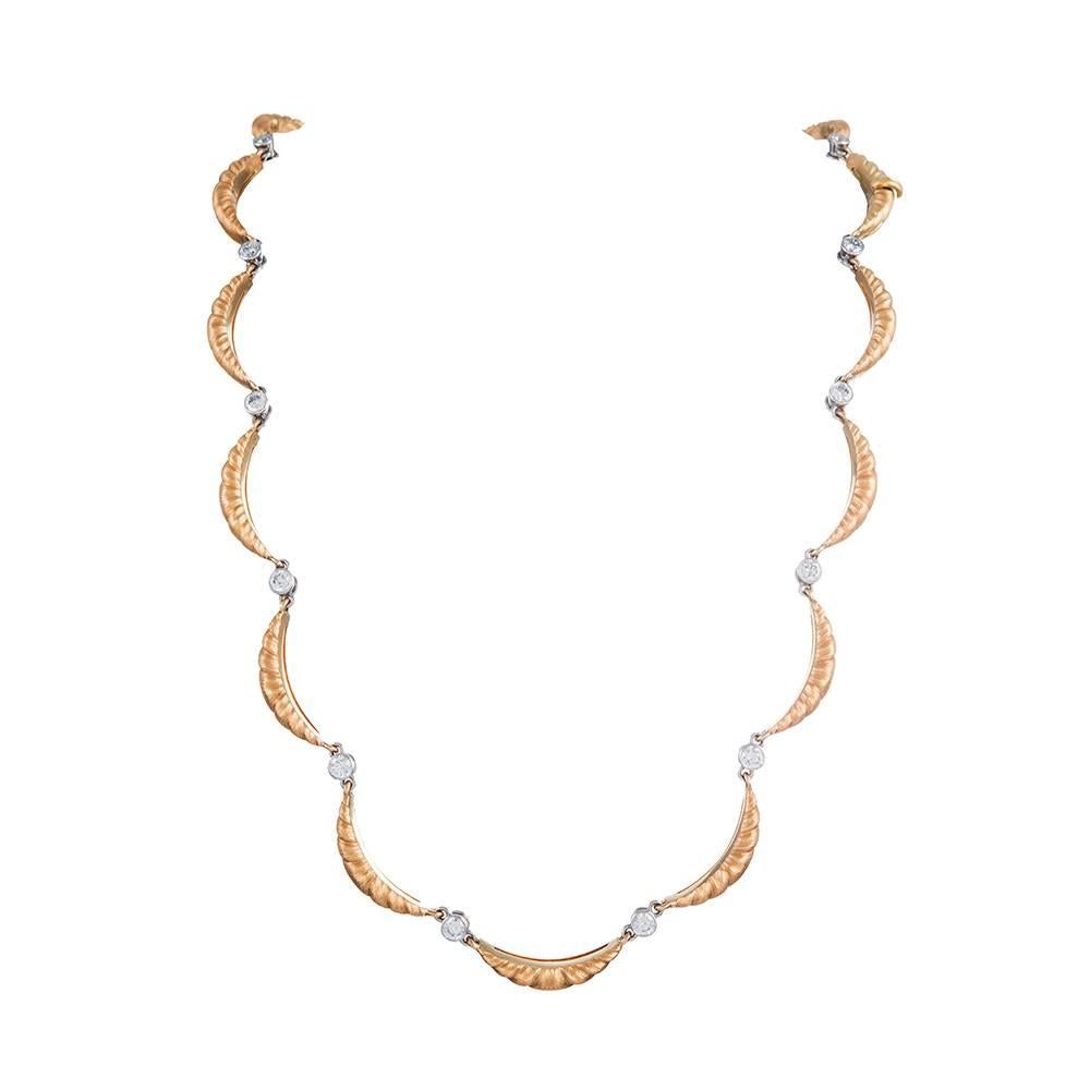 The symbolism of the Renaissance inspired Fourtane master jeweler, Juan Da Silva to design and create this one of a kind masterpiece. Handcrafted 18k yellow gold, the necklace boasts16 brushed half-moon shaped links, each set with a .005 ct round