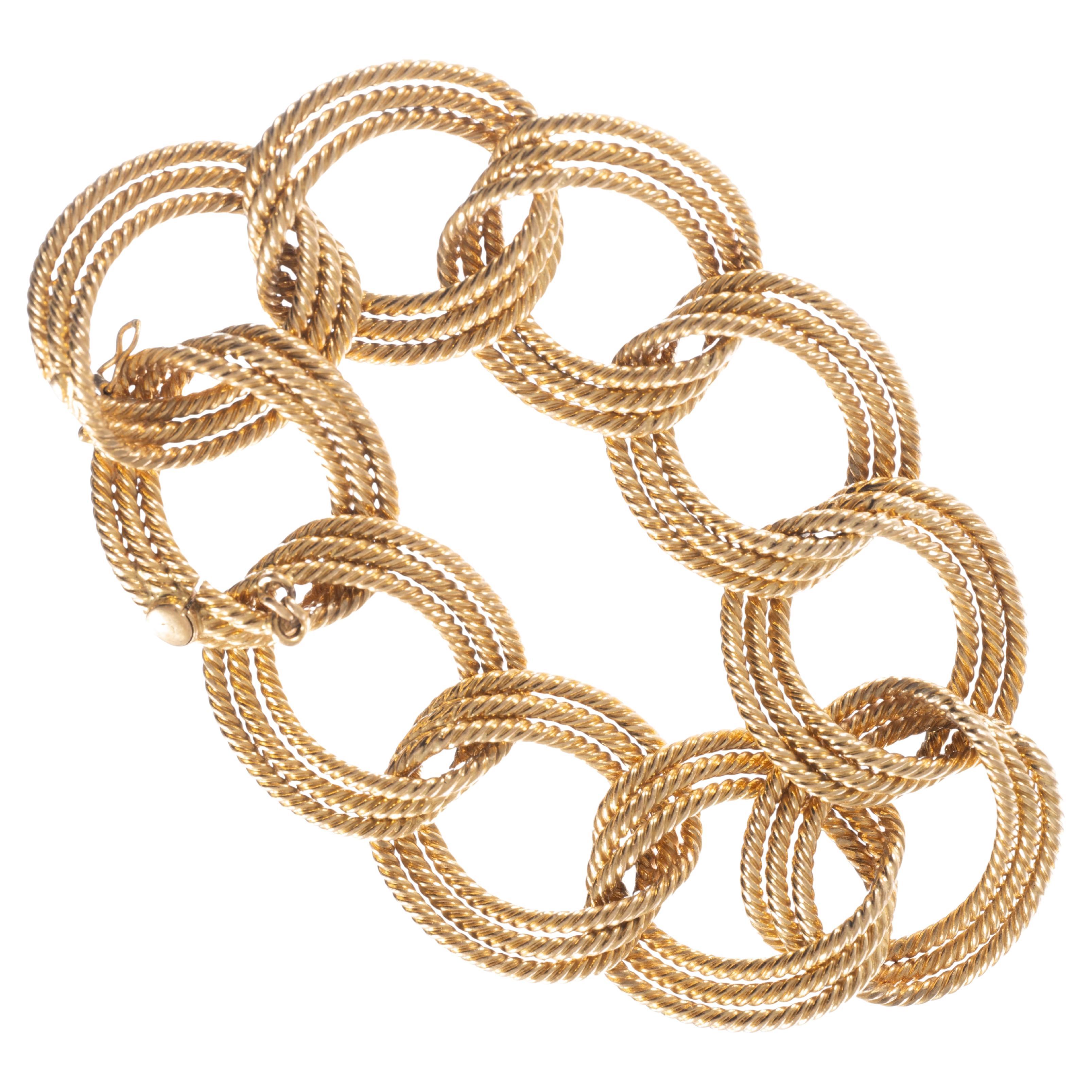 Bracelet stylisé en or jaune 18k des années 1960 avec fils torsadés et cercles concentriques en vente