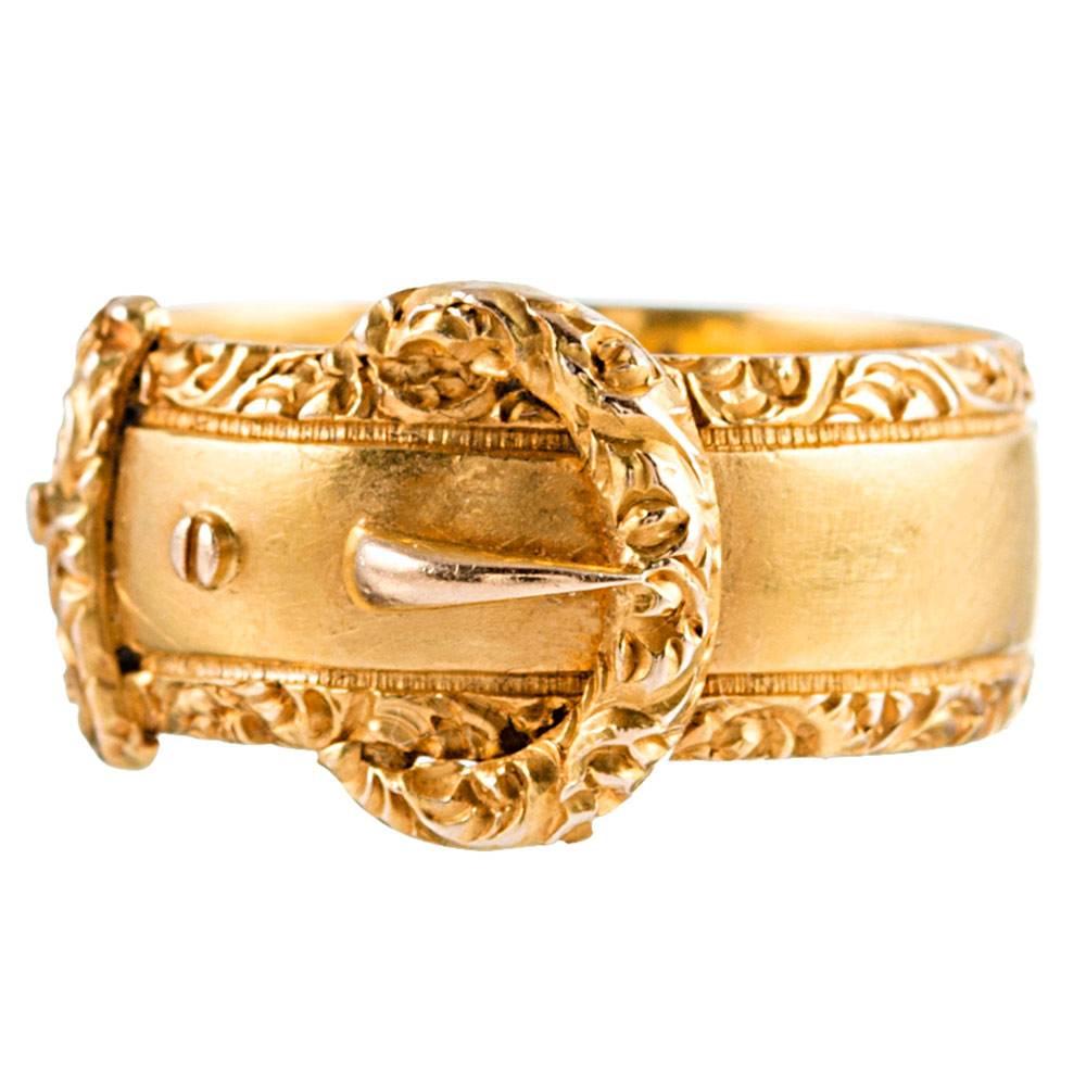 Made of 18 karat yellow gold and boasting a full compliment of hallmarks inside the shank, the ring is beautifully finished with embellishments along the edges. Size 5.5 can be modestly resized on request. Circa 1880