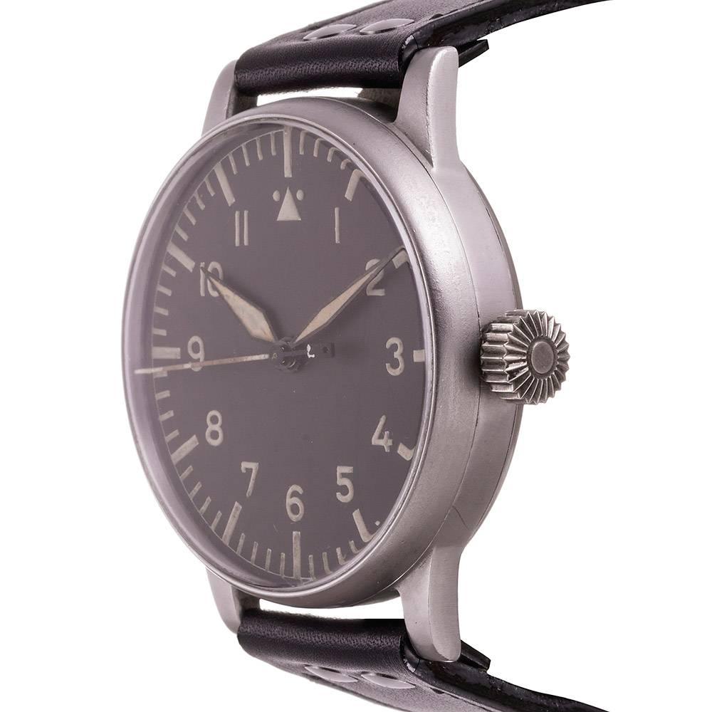 This is an exceptional vintage timepiece, relevant in many regards to the collector of cool rarities. Offered in beautiful, mint original condition, recently serviced and running perfectly, this enormous World War II pilot’s watch measures an
