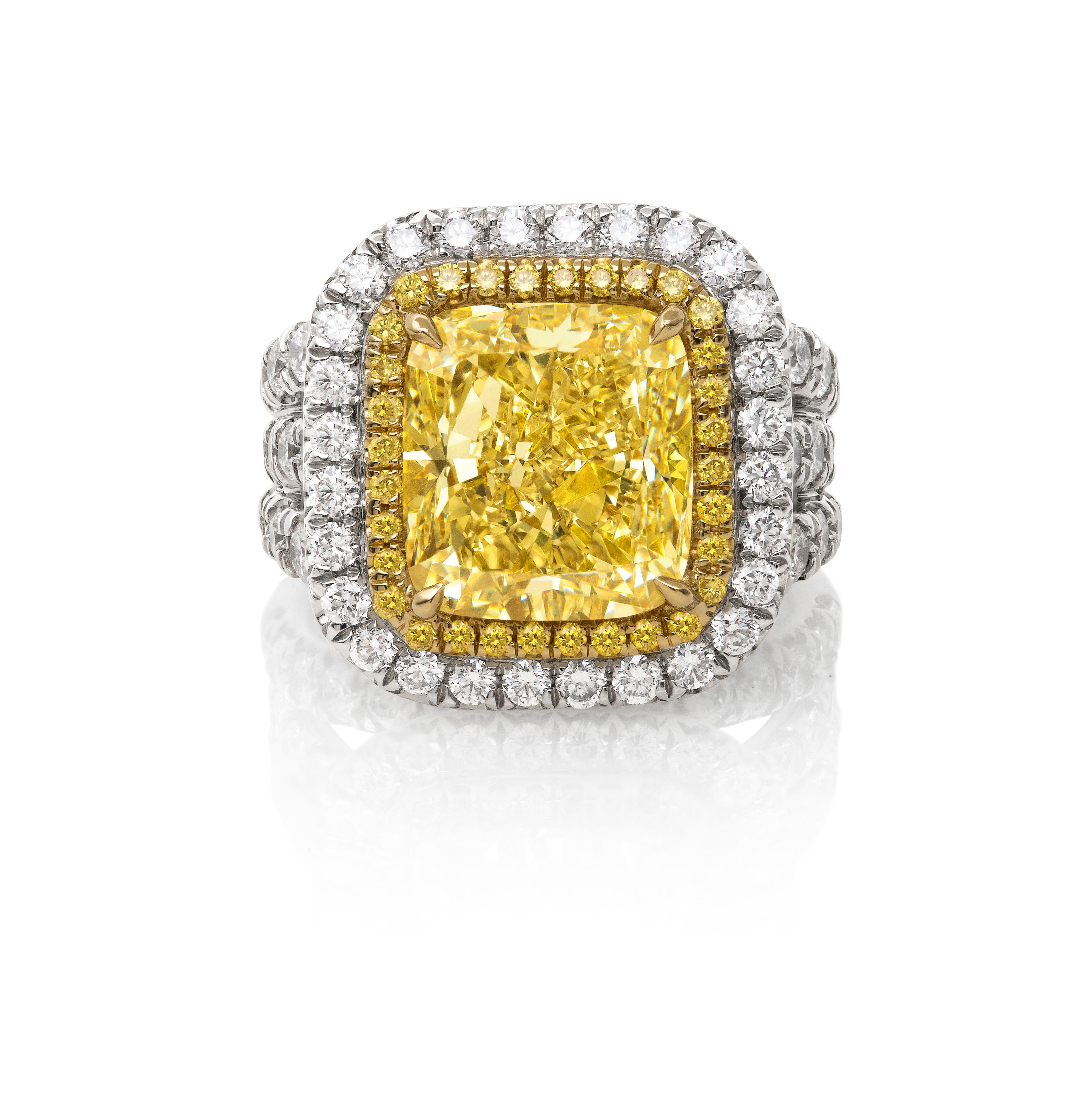 Stunning Platinum and 18 Karat Gold Fancy Yellow Diamond Ring In Excellent Condition In Princeton, NJ