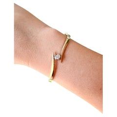 Vintage 14K Yellow Gold Diamond Bypass Hinged Bangle Bracelet