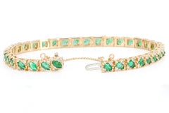 Pulsera vintage de oro amarillo de 14k con esmeraldas y diamantes