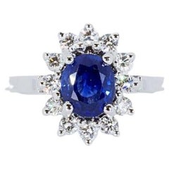 18K White Gold Diana Ring with 1.1 total Ct of Diamonds and Sapphire, NGI Cert