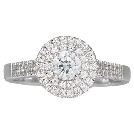 Exquisite 0.85ct Halo Ring in 14K White Gold For Sale