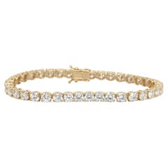 Pulsera tipo «tenis» de diamantes de 11,66 quilates, certificada por el IGI, en oro amarillo de 18 quilates