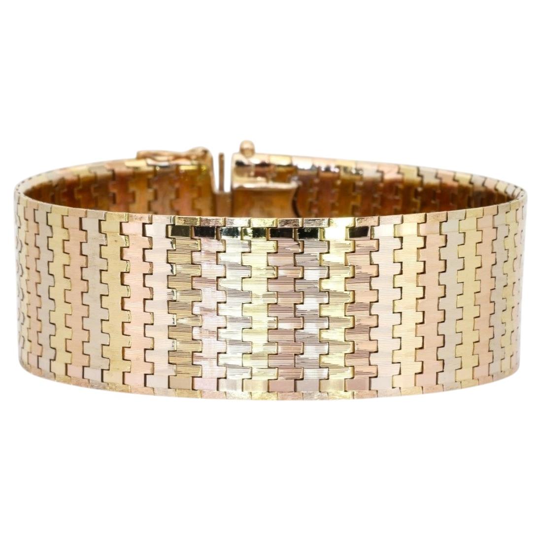 Bracciale rigido in oro giallo 18 carati da 61,37 grammi