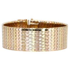 Bracciale rigido in oro giallo 18 carati da 61,37 grammi
