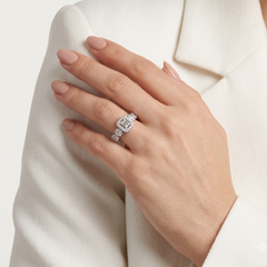 Sophisticated 0.95ct Round and 0.10ct Baguette Diamond Halo Ring
