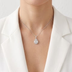 Superbe pendentif « Illusion » avec diamant naturel de 1,41 ct, taille poire, monté en grappe et entouré d'un halo