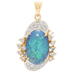 Radiant Blue Opal Cabochon with 0.30ct Diamond Halo Pendant in 18K Two-Tone Gold